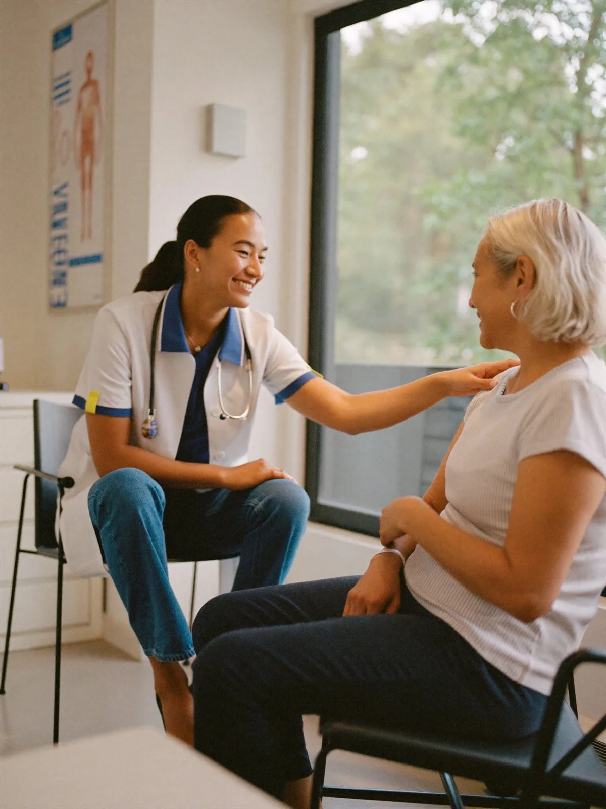 A PHC clinician with a patient